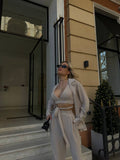 Set tre pezzi camicia top e pantalone beige