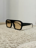 Occhiale nero con lente chiara