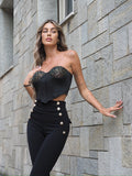 Bustino nero con paillettes