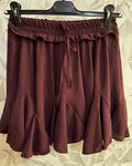 Gonna a ruota con pantaloncino