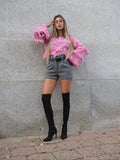 Maglione rosa barbie con frange