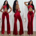 Tuta rossa con incrocio e frange in strass