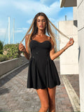 Abito corto nero con strass
