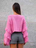 Maglione rosa barbie con frange