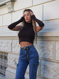 Jeans cargo con tasconi