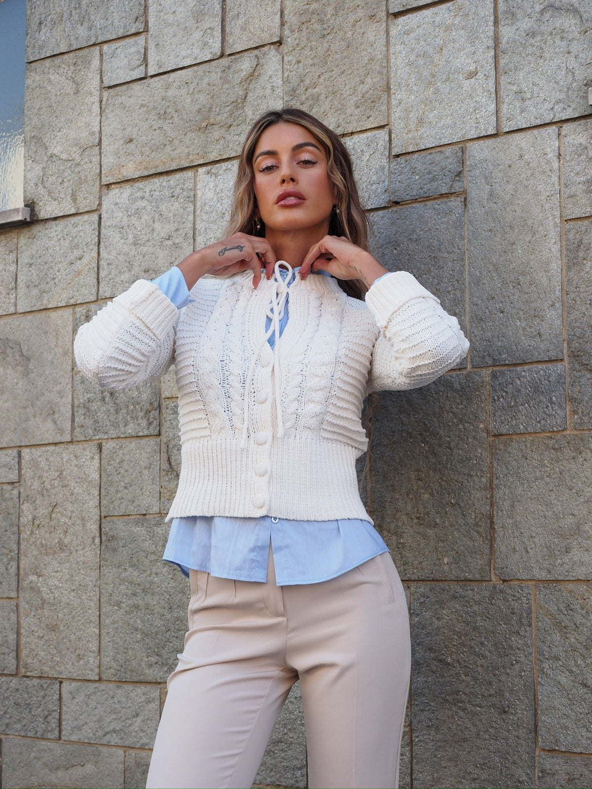 Maglione panna con trecce