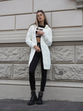 Cardigan bianco a trecce
