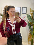 Pantalone in ecopelle con righe bianche