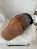 Cappello con visiera camoscio