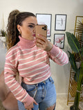 Pull rosa spalla aperta e perle