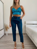 Top con paillettes petrolio