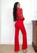 Tuta con maniche in pizzo rosso