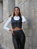 Completo smanicato e pantalone ecopelle