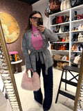 Jeans con borchie laterali