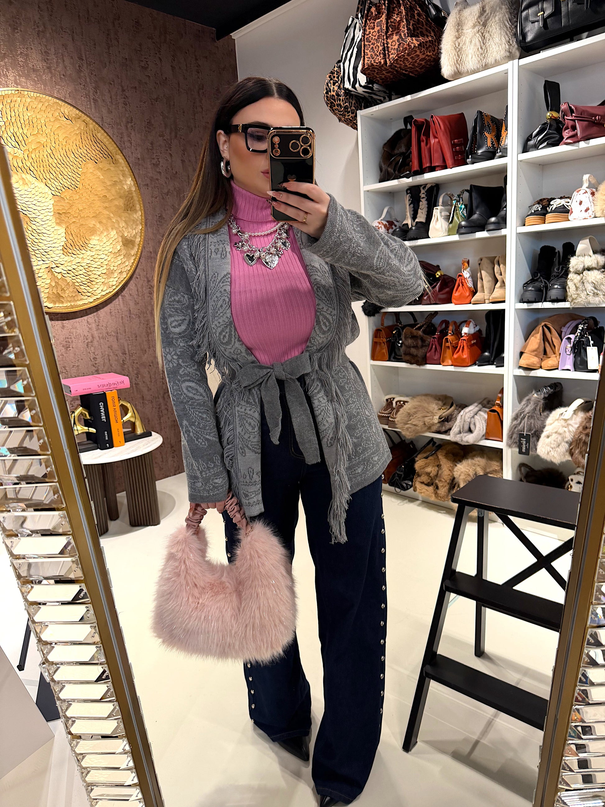 Jeans con borchie laterali