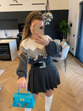 Maglione grigio con maxi paillettes