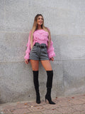 Maglione rosa barbie con frange