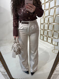 Pantalone con fibbia laterale