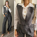 Completo smanicato e pantalone grigio