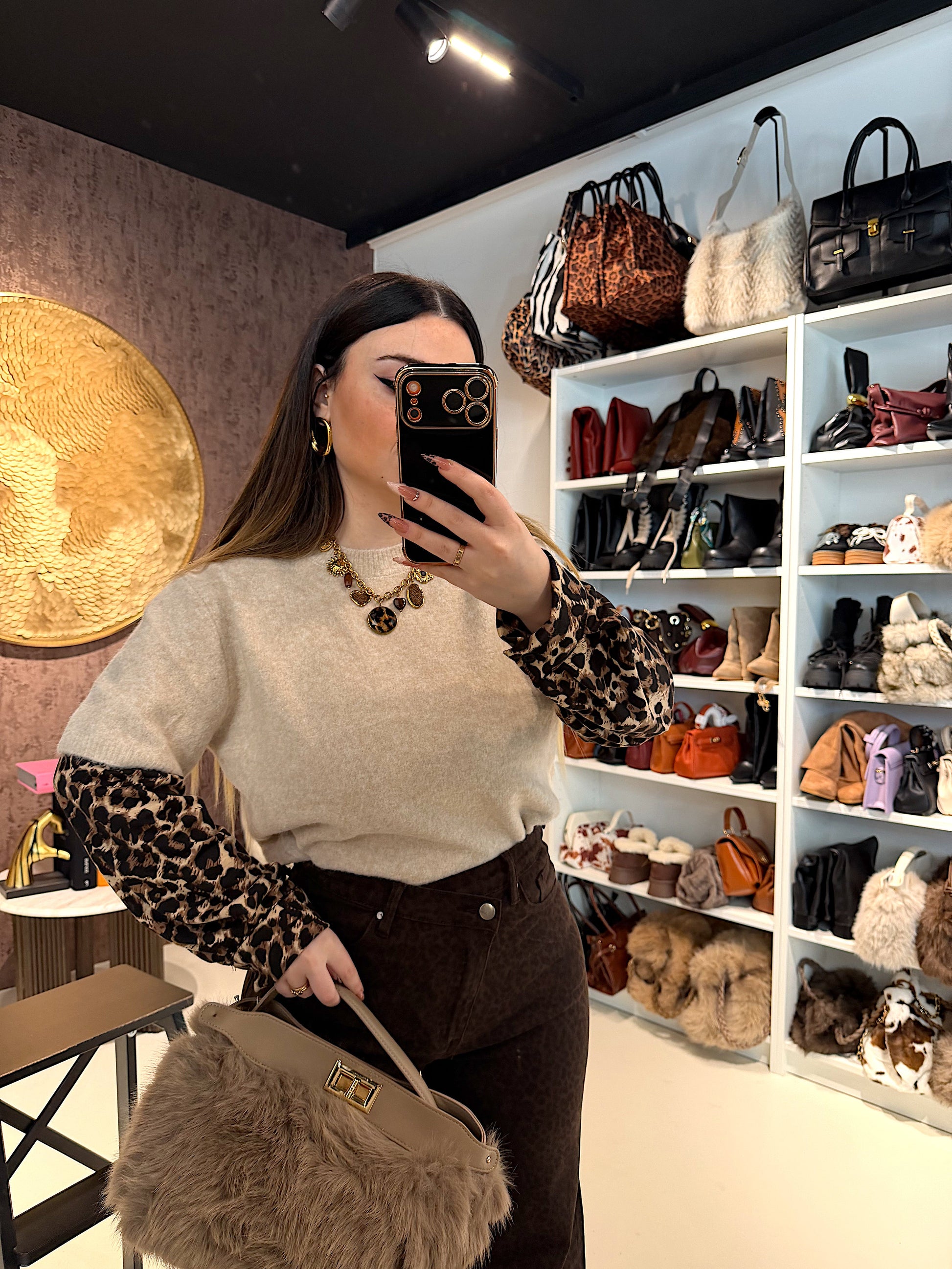 Maglione maniche maculato