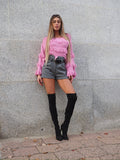 Maglione rosa barbie con frange