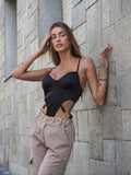 Body nero sgambato con gioiello
