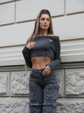 Maglione grigio con scollo a barchetta