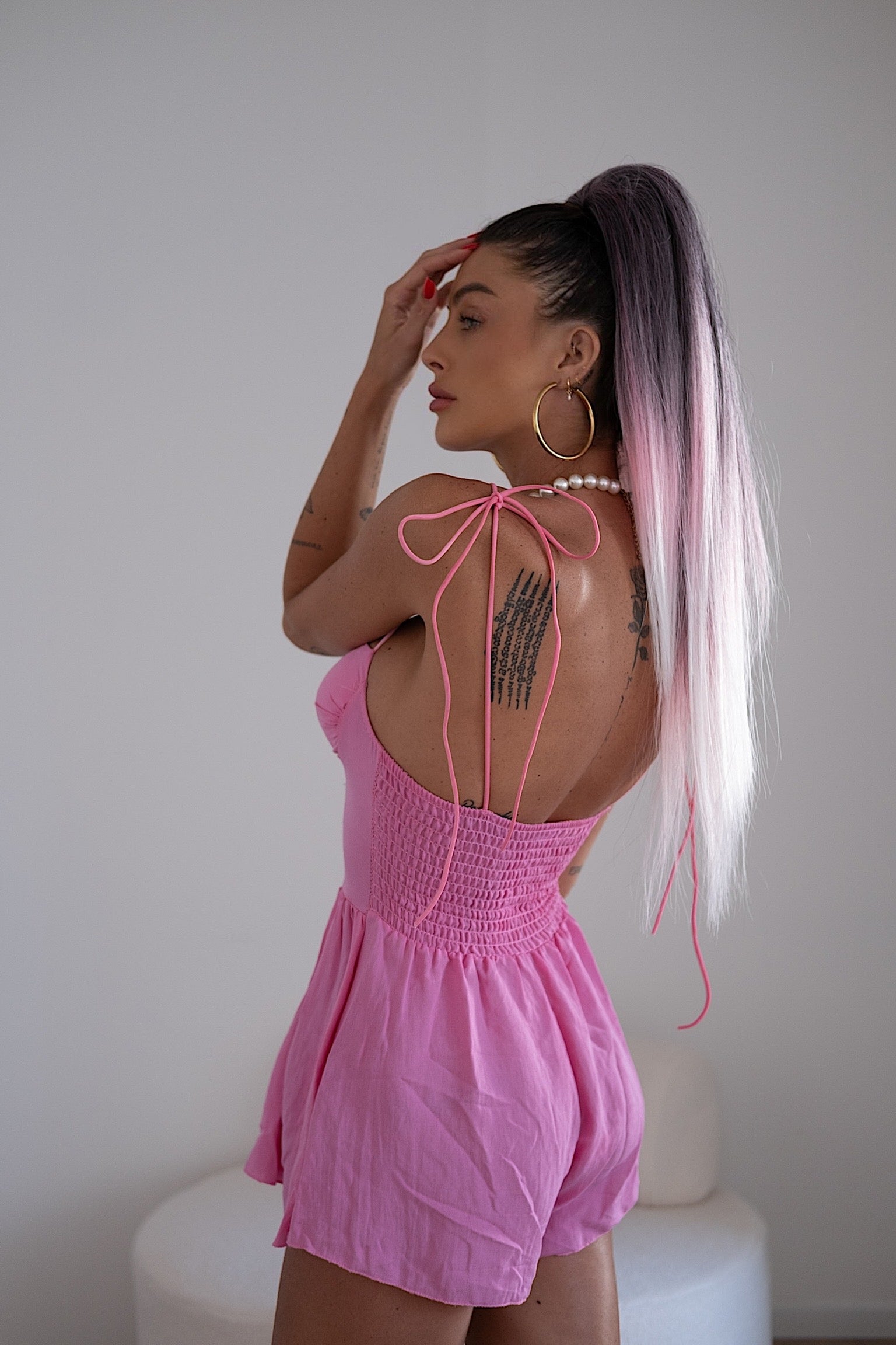 Tutina rosa con bottoncini