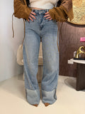 Jeans con risvolto e strass