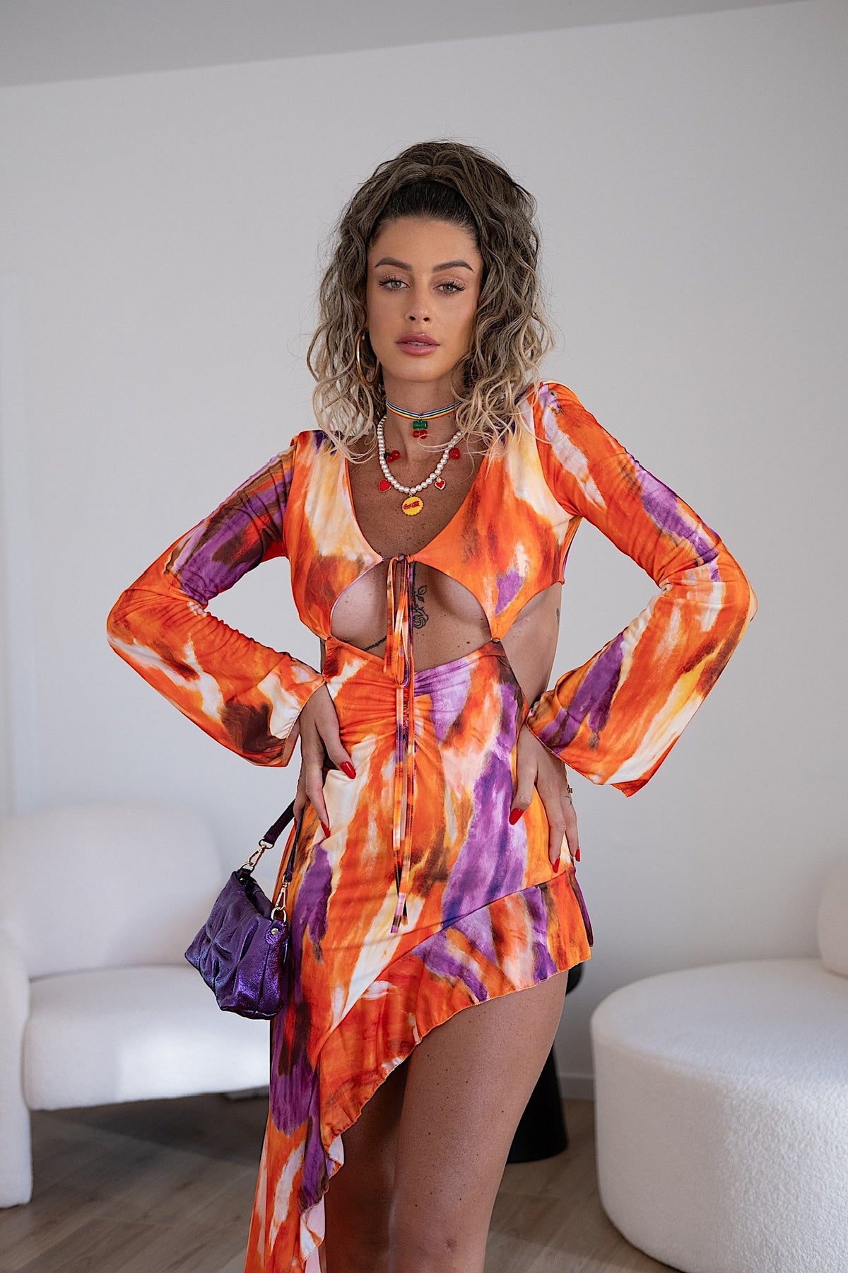 Abito asimmetrico arancio viola