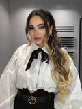 Camicia bianca con fiocco