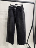 Jeans nero con strass e ricami