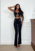 Completo top e pantalone con bottoncini in strass