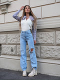Jeans chiaro con strappi