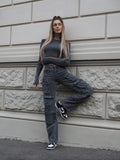 Maglione grigio con scollo a barchetta