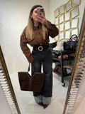 Jeans con risvolto e strass