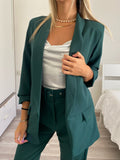 Completo giacca e pantalone verde bottiglia