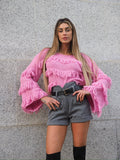 Maglione rosa barbie con frange