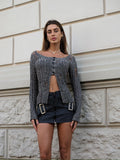 Maglione con bottoni nero/ grigio