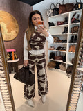 Completo top e pantalone cow print