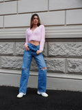 Jeans vita bassa con strappi