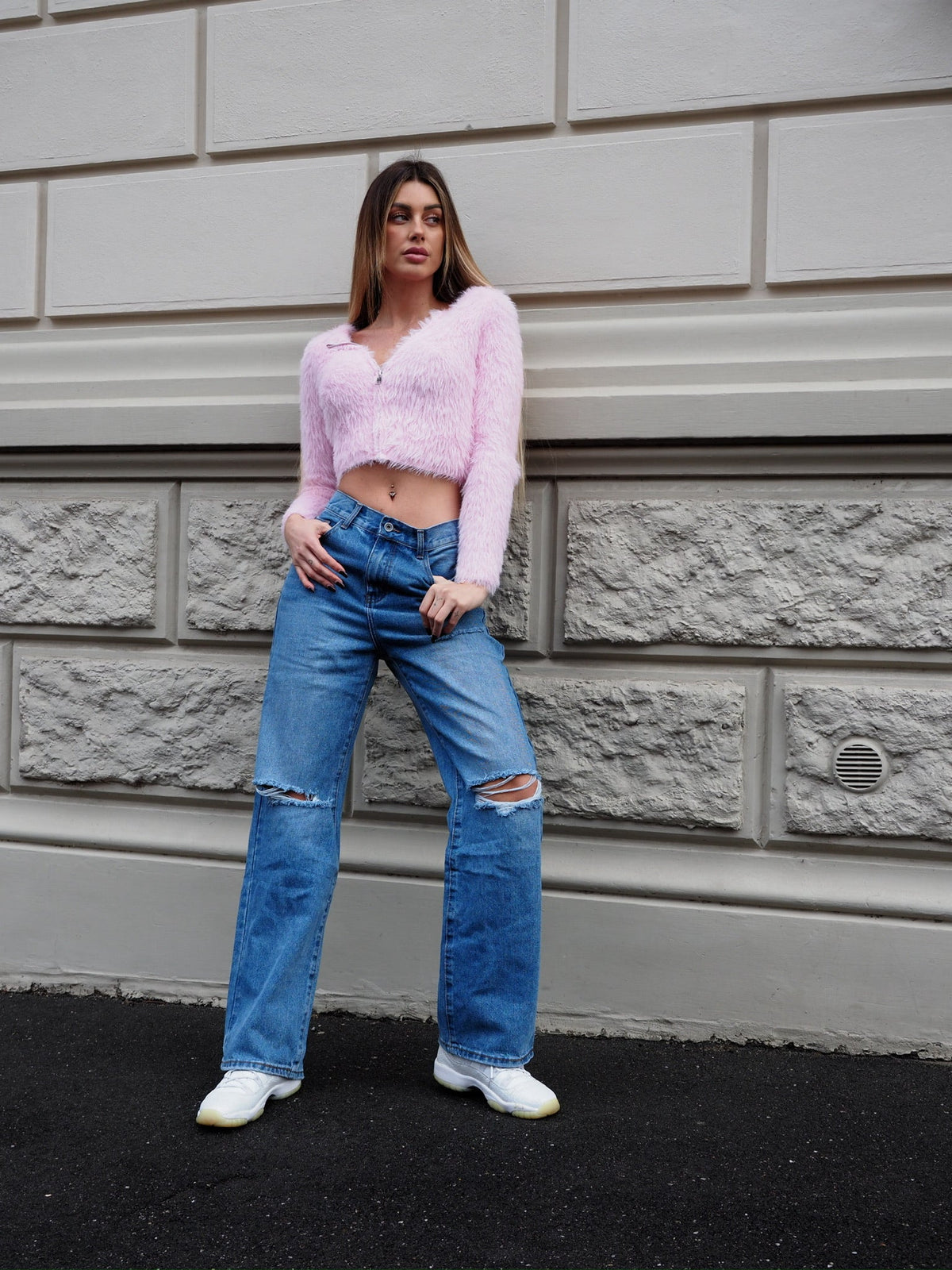 Jeans vita bassa con strappi