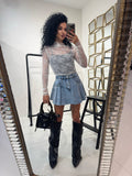 Maglia in pizzo collo alto