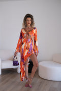 Abito asimmetrico arancio viola