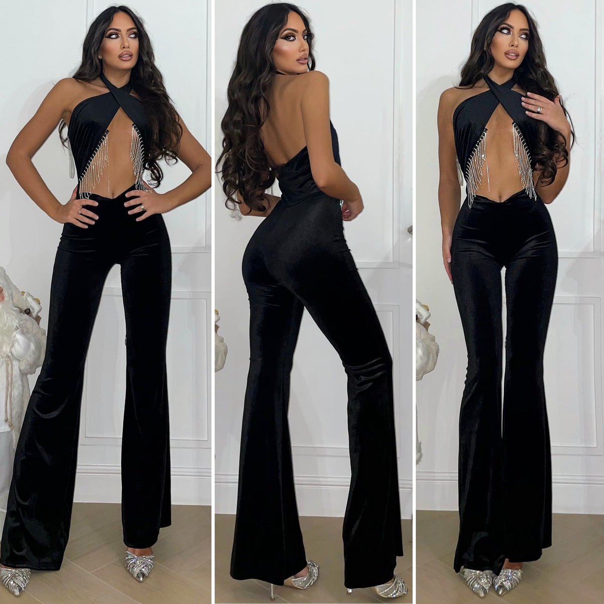 Tuta nero con incrocio e frange in strass