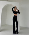 Due pezzi top e pantalone nero