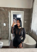 Abito nero con trasparenze