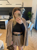 Maglia crop nera collo alto