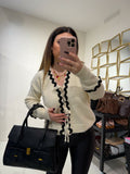 Cardigan con ricamo e lacci