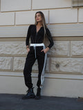 Pantalone sportivo con righe bianche